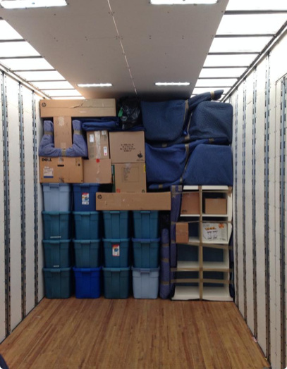 A moving truck expertly packed by First Rate Movers